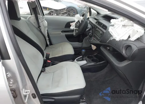 2013 Toyota Prius C One z USA, uszkodzony, nr VIN JTDKDTB39D1047551